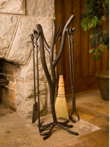 Broom by fireplace